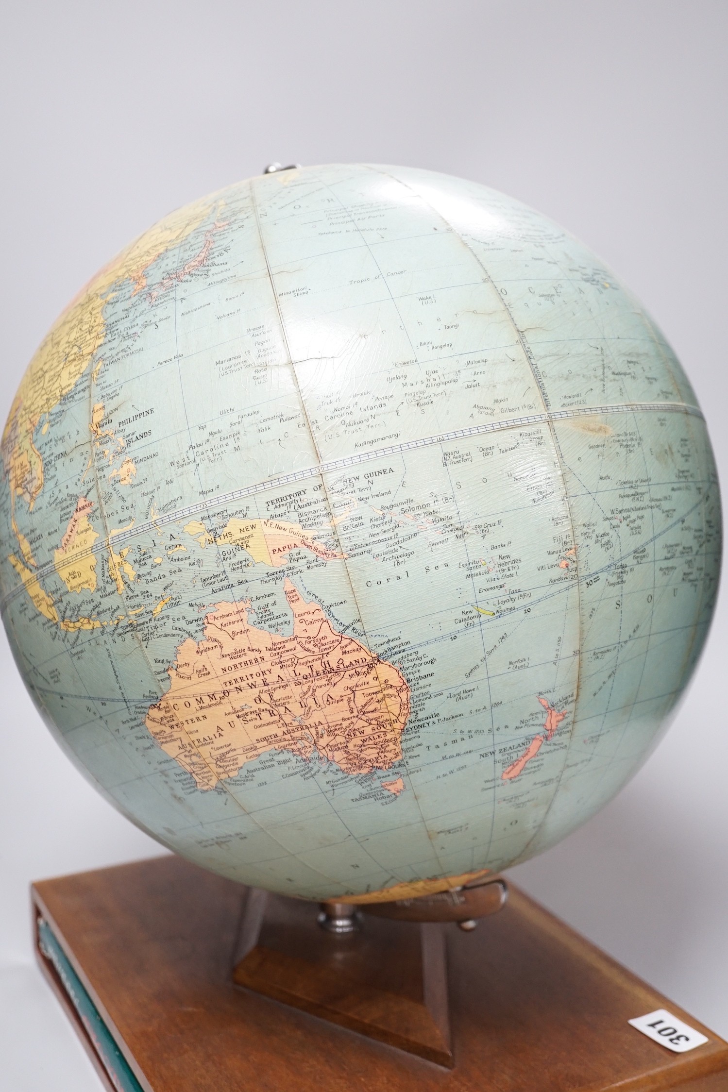 A Philips Challenge Globe, on stand, 46cm high, with atlas